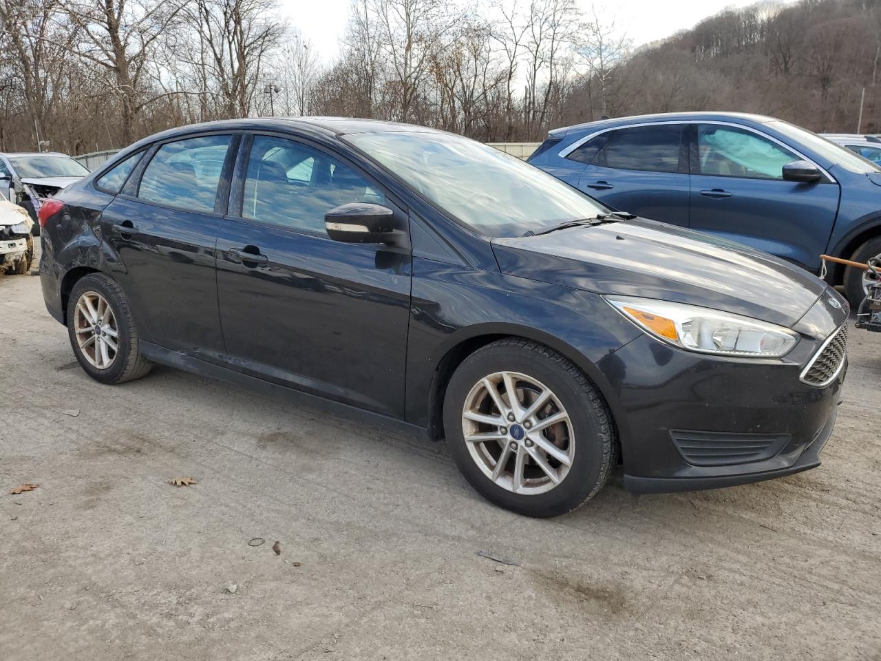 2015 Ford Focus Se VIN: 1FADP3F25FL260401 Lot: 81363454