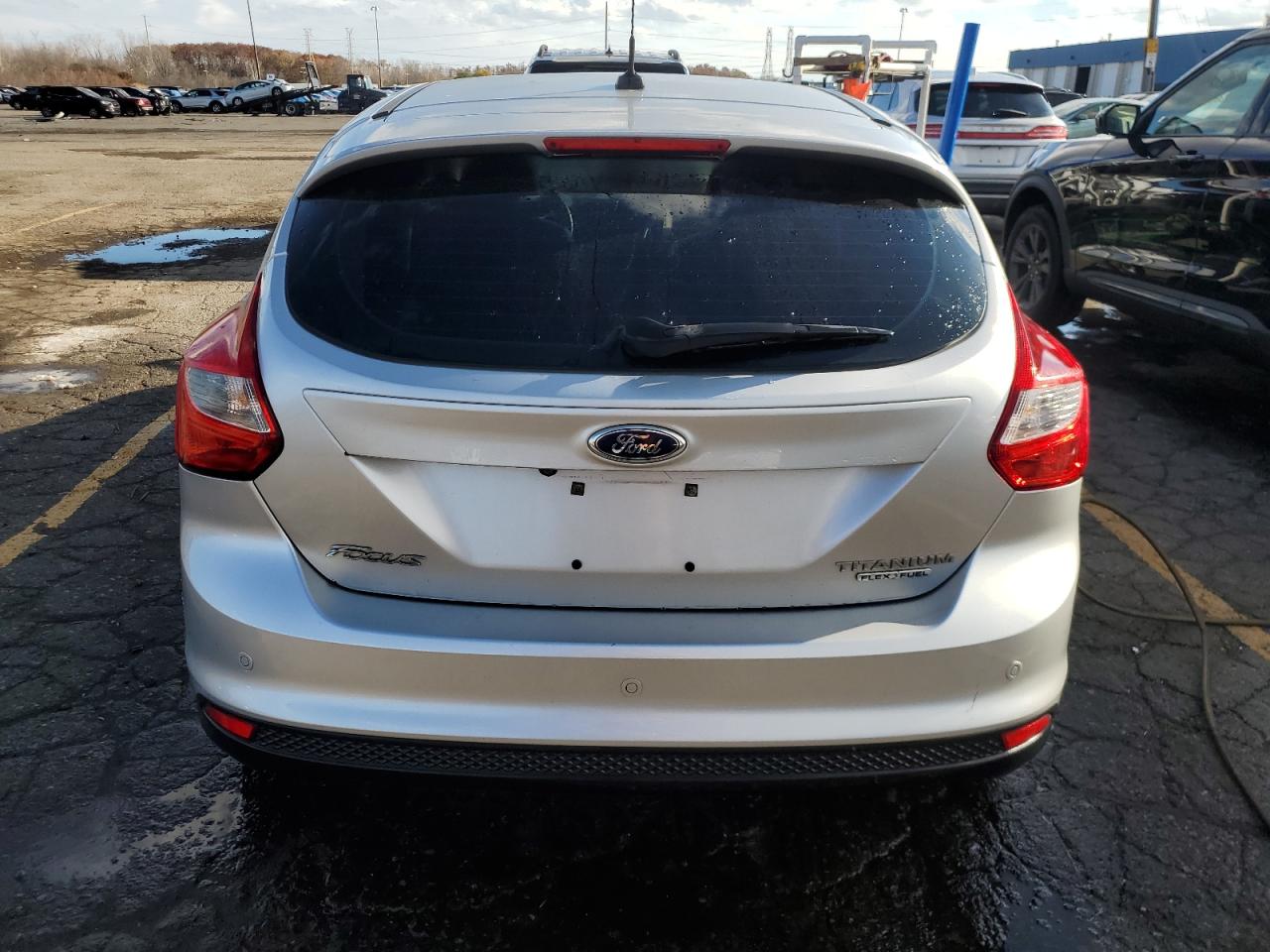 2014 Ford Focus Titanium VIN: 1FADP3N26EL194599 Lot: 79344684