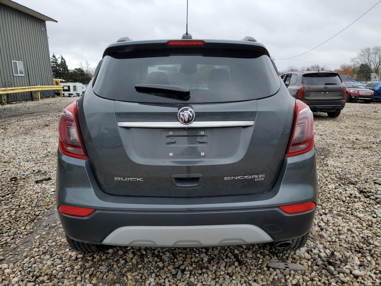 2018 Buick Encore Essence VIN: KL4CJGSB9JB522871 Lot: 80690544