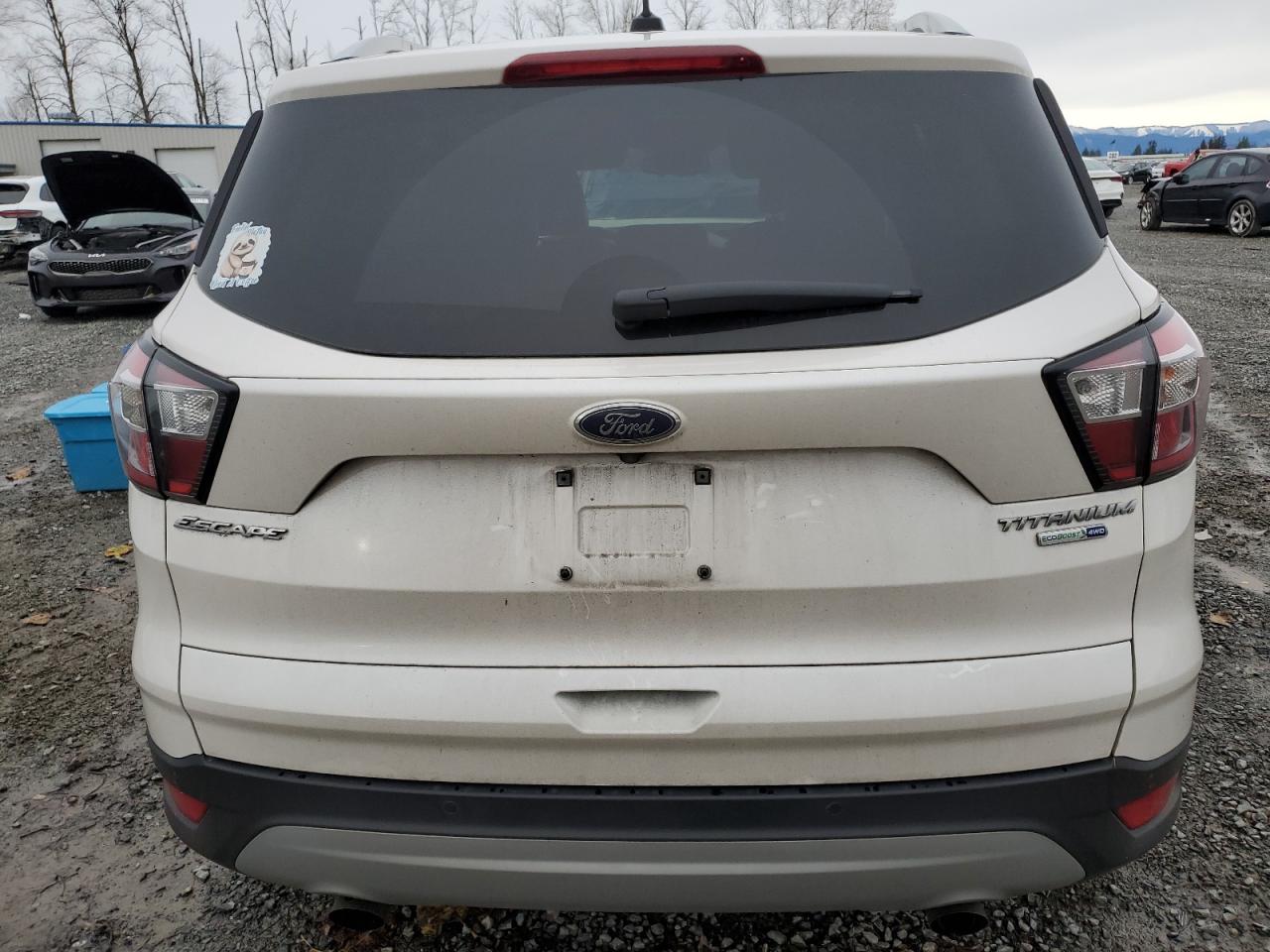 2017 Ford Escape Titanium VIN: 1FMCU9JD3HUE37496 Lot: 81544604