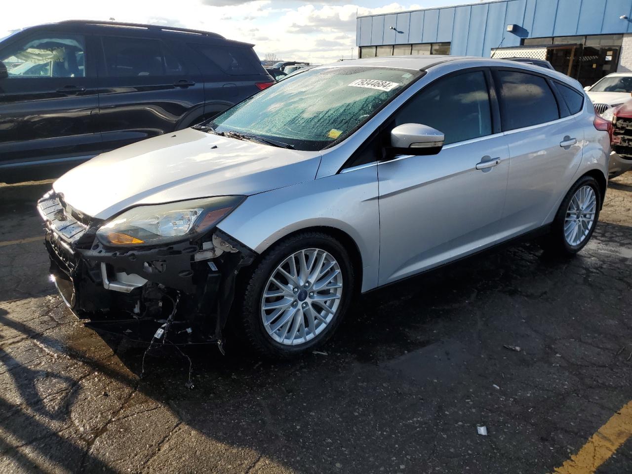 2014 Ford Focus Titanium VIN: 1FADP3N26EL194599 Lot: 79344684