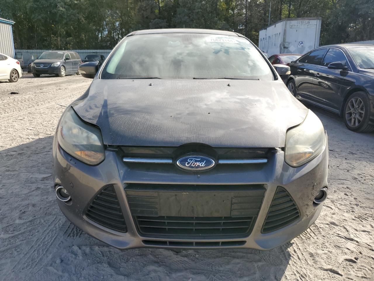 2012 Ford Focus Titanium VIN: 1FAHP3N26CL277111 Lot: 76823744