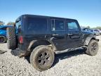 2011 Jeep Wrangler Unlimited Sahara продається в Hueytown, AL - Side