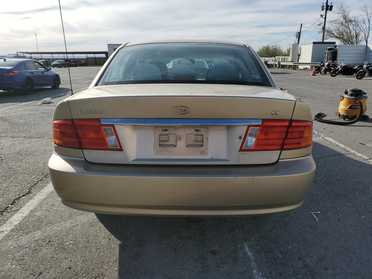 2002 Kia Optima Magentis VIN: KNAGD126X25156415 Lot: 80253444