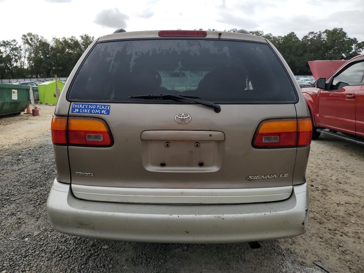 1999 Toyota Sienna Le VIN: 4T3ZF13C9XU167304 Lot: 81339034