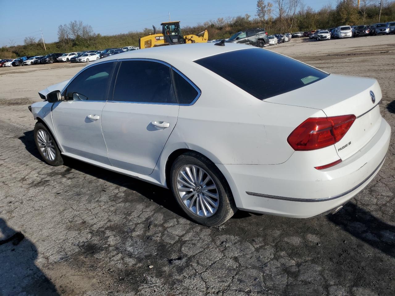 2016 Volkswagen Passat Se VIN: 1VWBT7A32GC010956 Lot: 80700944