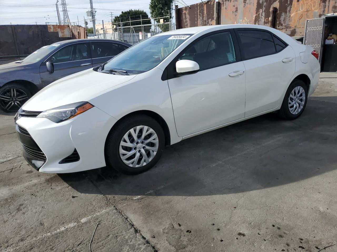 VIN 5YFBURHE7HP700715 2017 TOYOTA COROLLA no.1