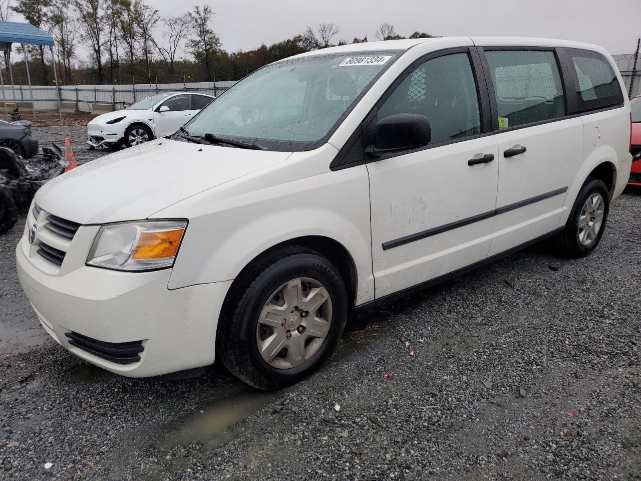 2009 Dodge Caravan - Image 1