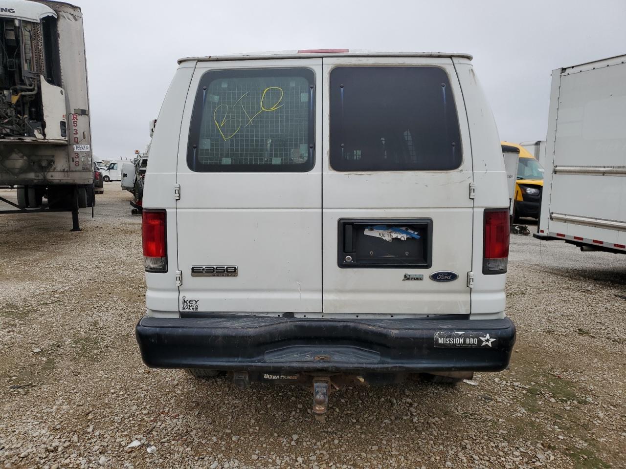 2009 Ford Econoline E350 Super Duty Van VIN: 1FTSE34L39DA01410 Lot: 77798344