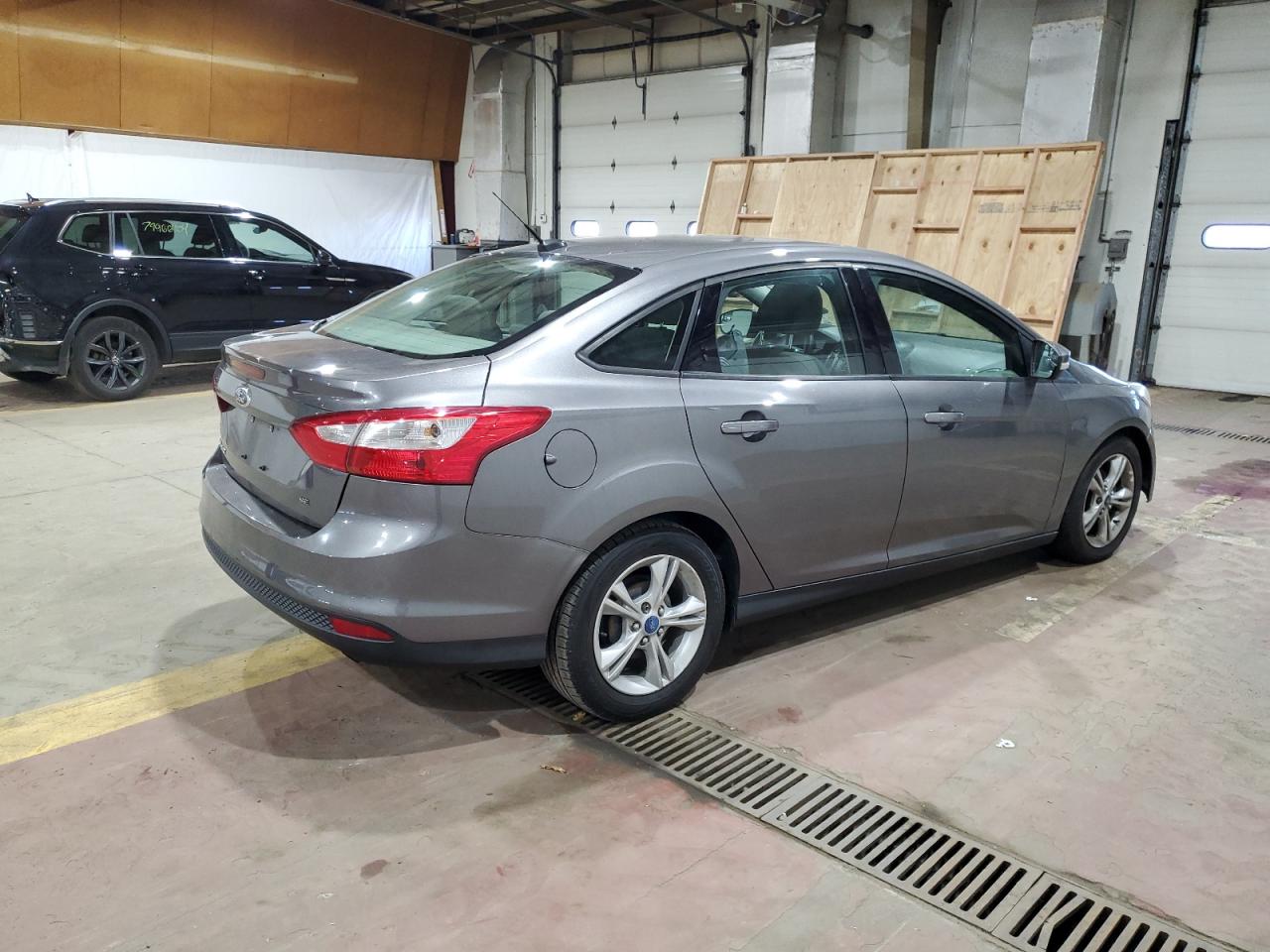 VIN 1FADP3F26EL102485 2014 FORD FOCUS no.3