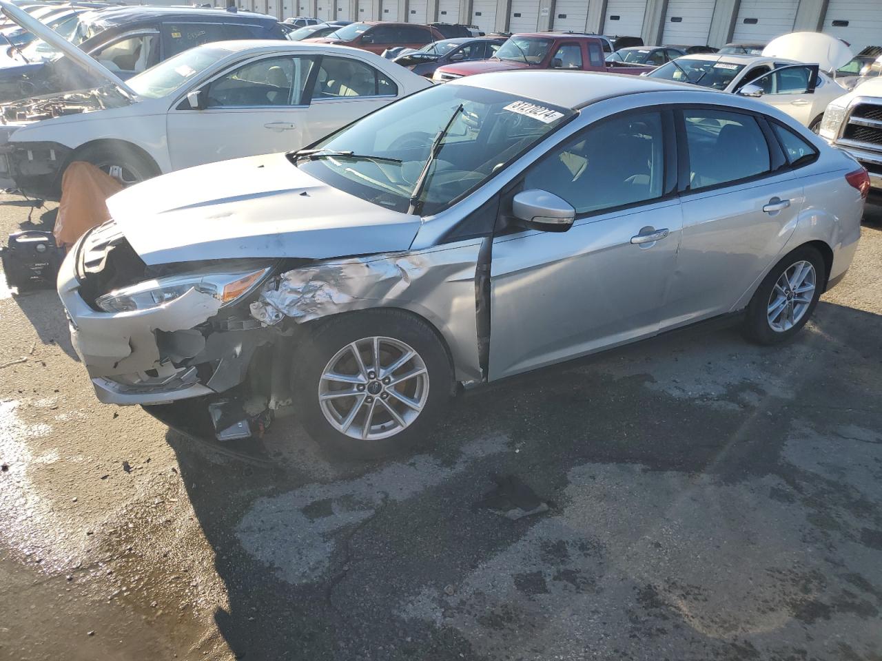 VIN 1FADP3F24GL382779 2016 FORD FOCUS no.1