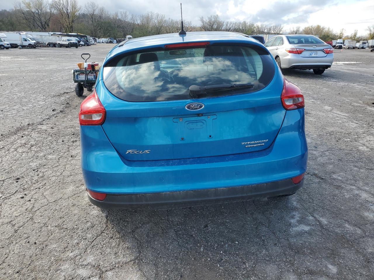 2015 Ford Focus Titanium VIN: 1FADP3N25FL231353 Lot: 79197734