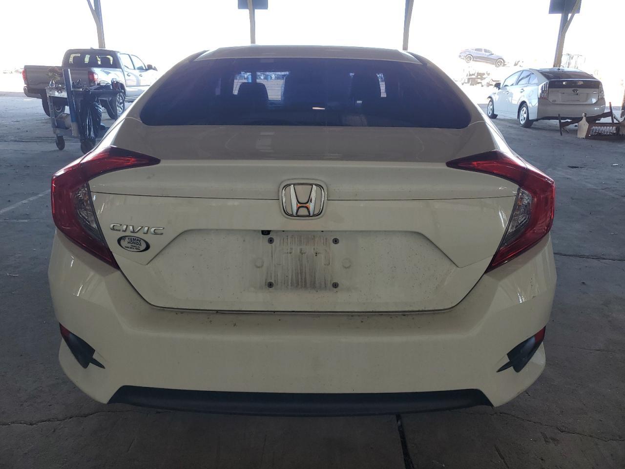 2018 Honda Civic Lx VIN: 19XFC2F51JE004325 Lot: 79465114