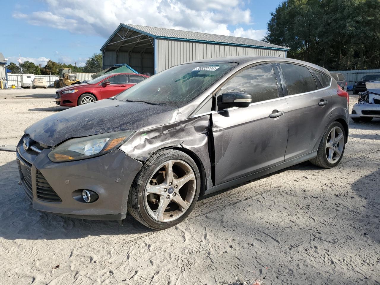 2012 Ford Focus Titanium VIN: 1FAHP3N26CL277111 Lot: 76823744