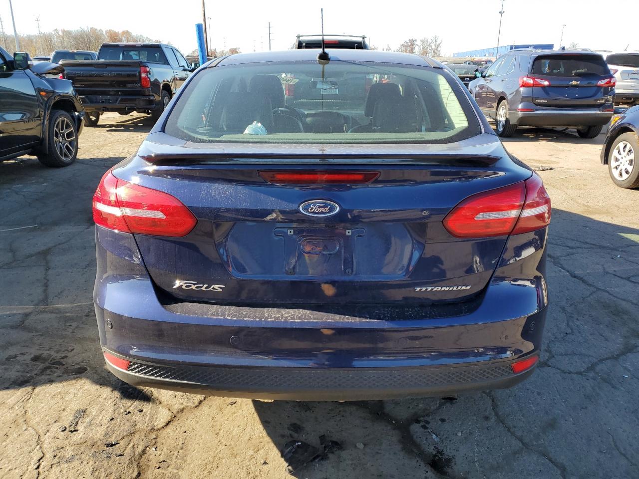 2017 Ford Focus Titanium VIN: 1FADP3J20HL287449 Lot: 79448614