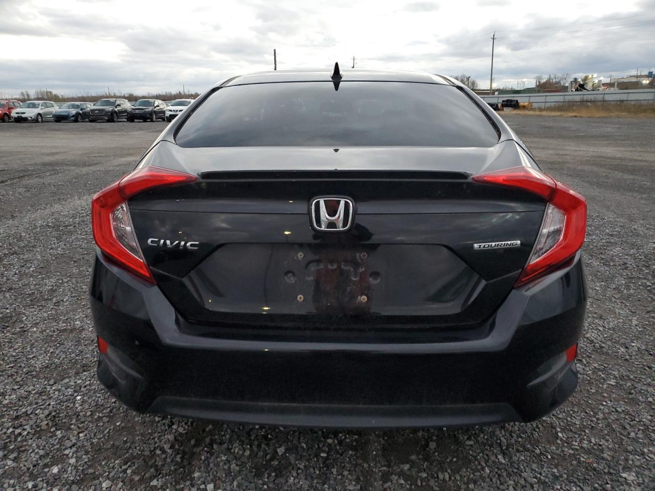 2017 Honda Civic Touring VIN: 2HGFC1F93HH104407 Lot: 79710264