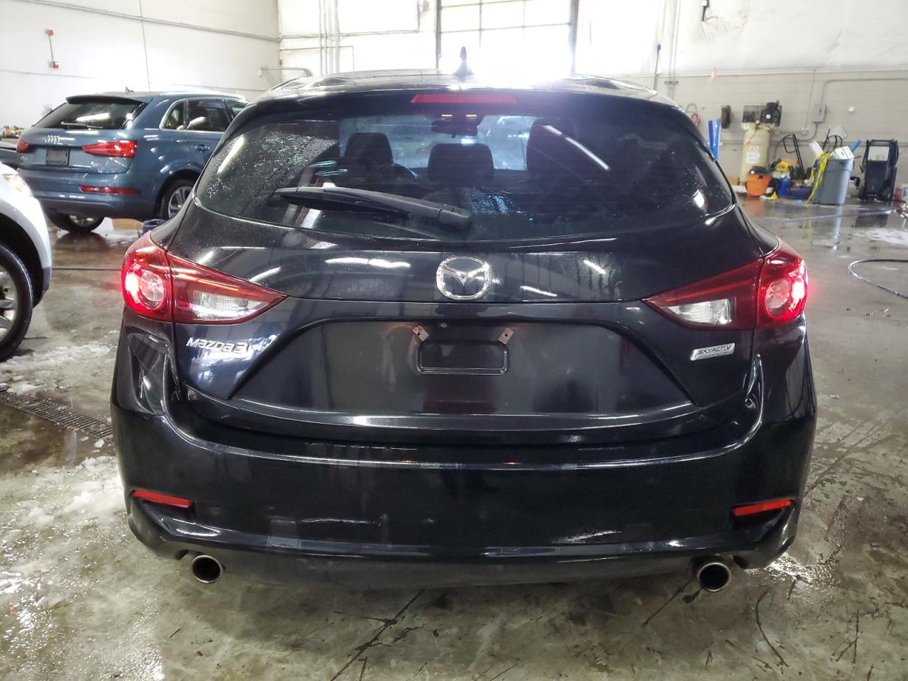 2018 Mazda 3 Touring VIN: 3MZBN1L33JM180589 Lot: 79567944