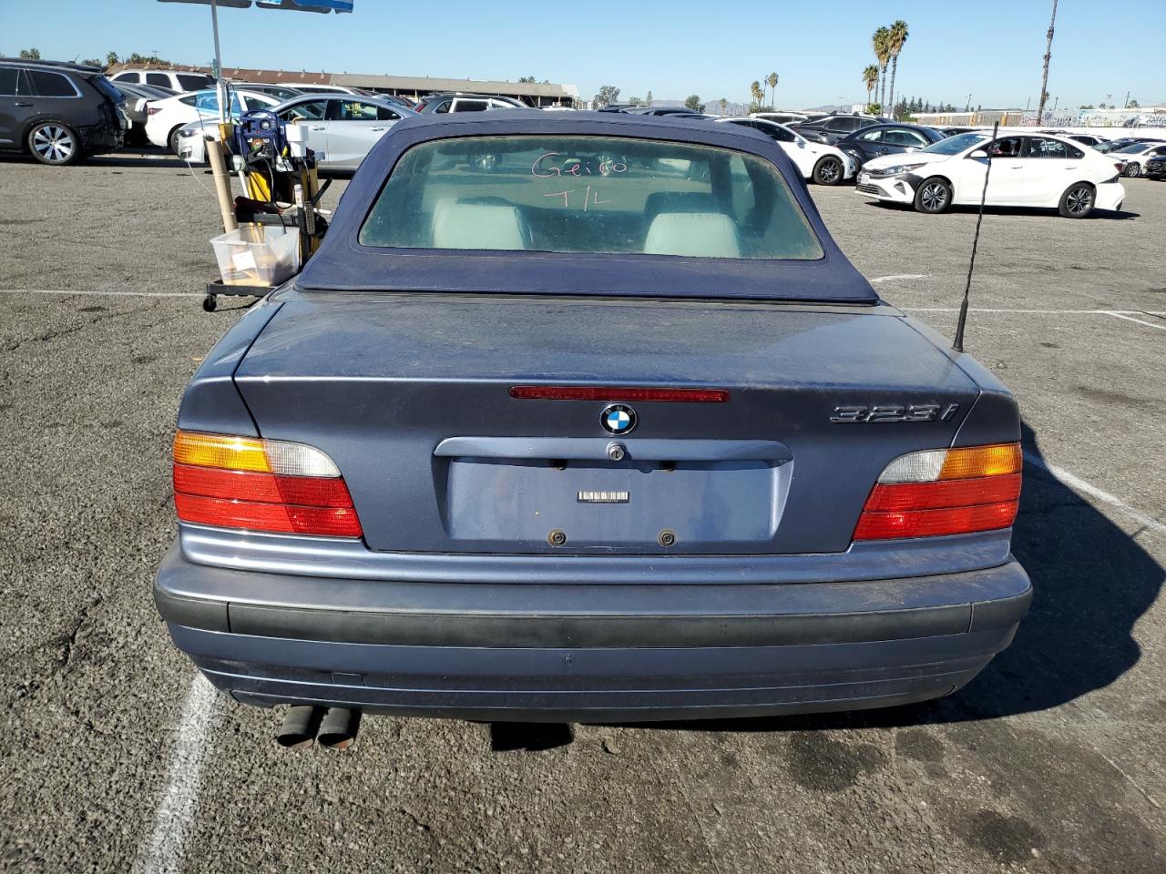 1999 BMW 323 Ic Automatic VIN: WBABJ8332XEM24560 Lot: 80756544