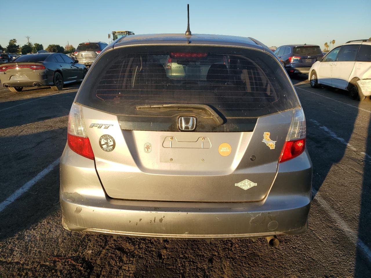 2009 Honda Fit VIN: JHMGE87299S067153 Lot: 80768384