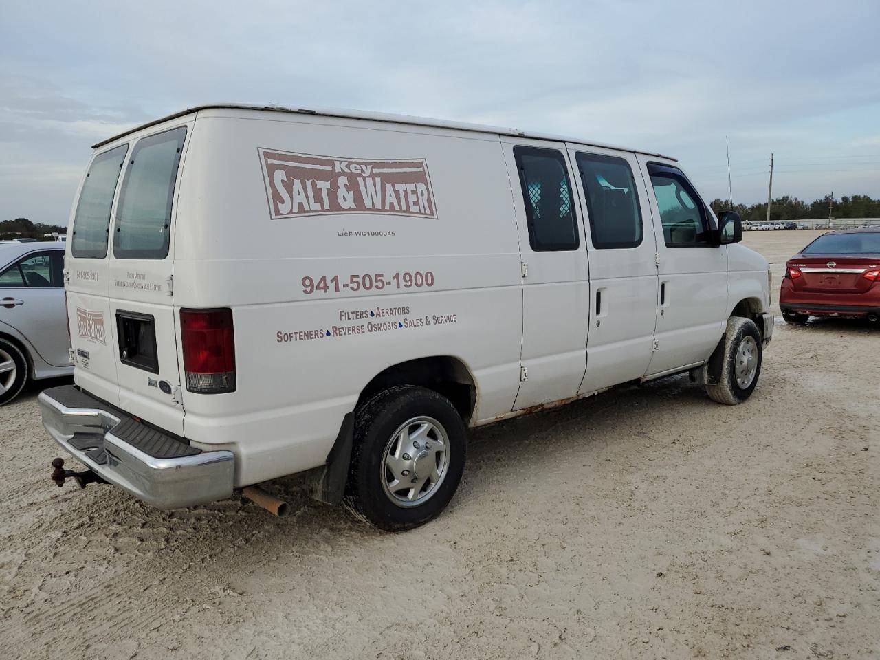 2009 Ford Econoline E150 Van VIN: 1FTNE14W69DA79580 Lot: 77773694