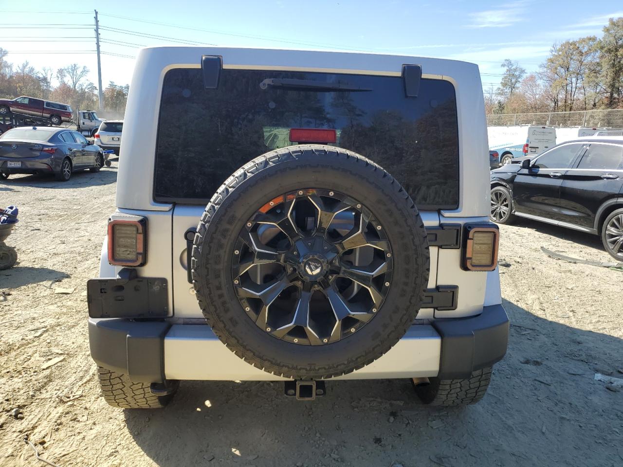 2011 Jeep Wrangler Unlimited Sahara VIN: 1J4BA5H16BL627992 Lot: 76204814