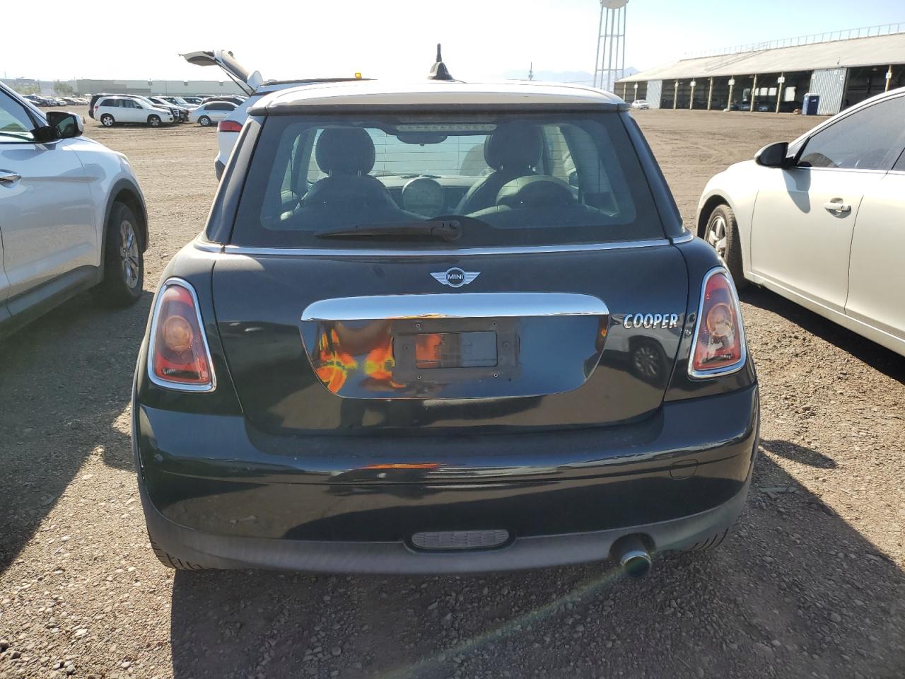 2009 Mini Cooper VIN: WMWMF33579TT68290 Lot: 76390724