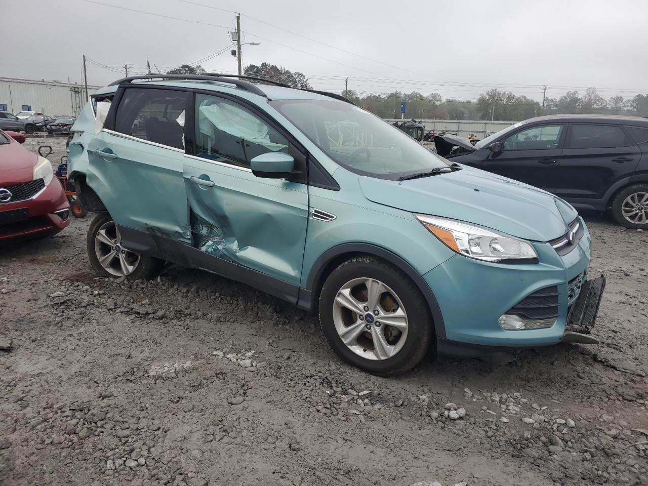 VIN 1FMCU0GX1DUC67663 2013 FORD ESCAPE no.4