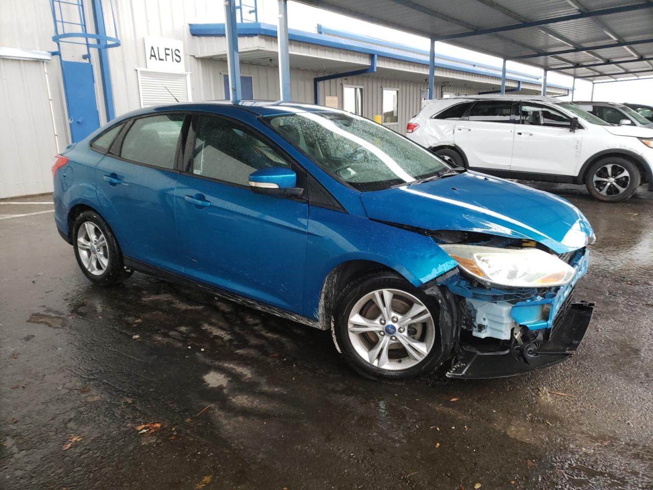 VIN 1FADP3F21DL117054 2013 FORD FOCUS no.4