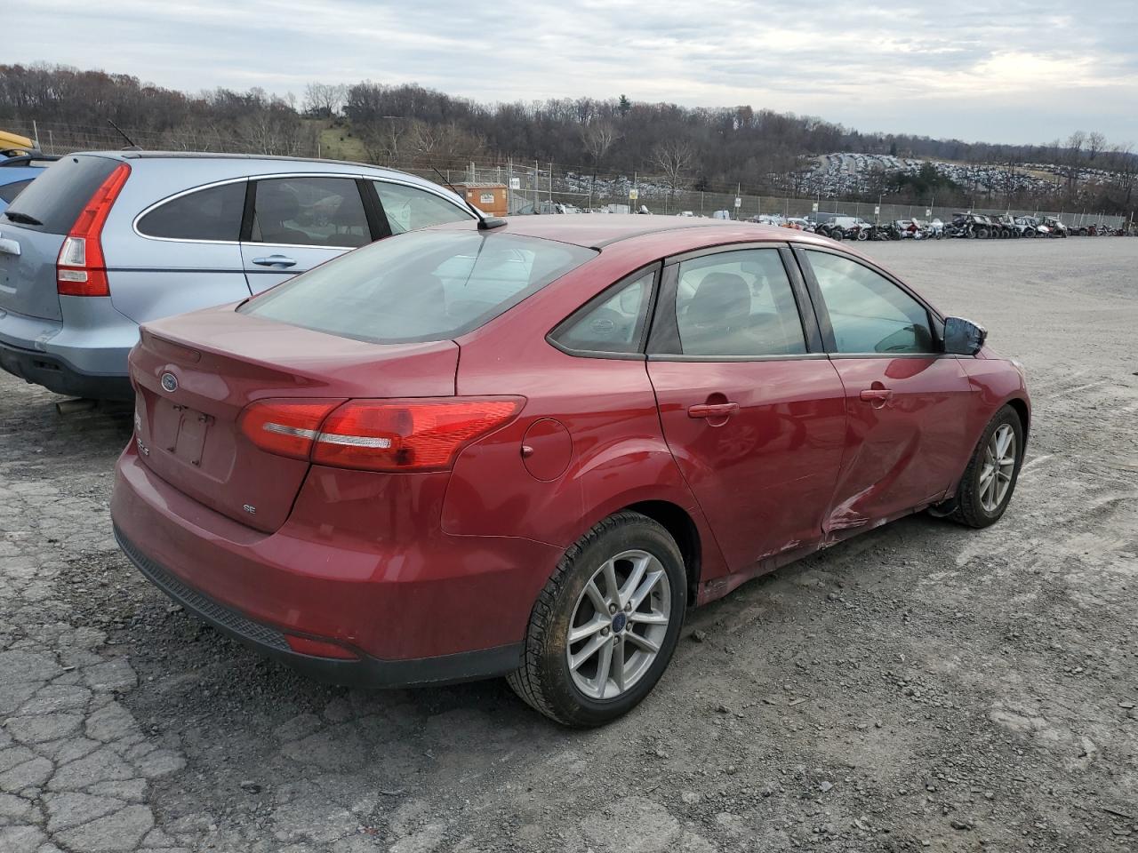 VIN 1FADP3F24GL318497 2016 FORD FOCUS no.3