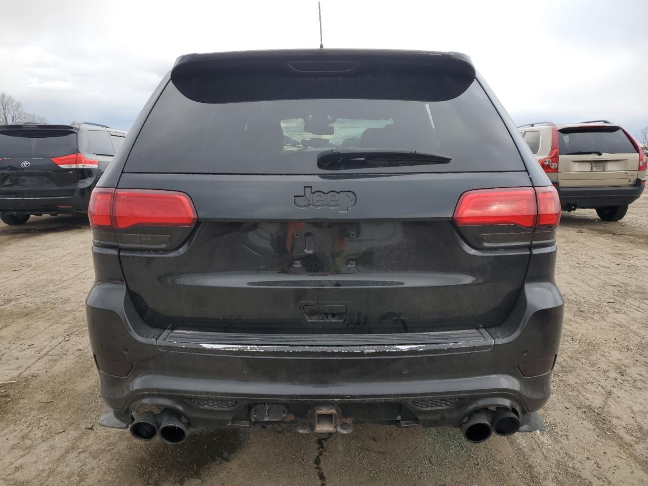 2012 Jeep Grand Cherokee Srt-8 VIN: 1C4RJFDJ7CC197732 Lot: 81389844