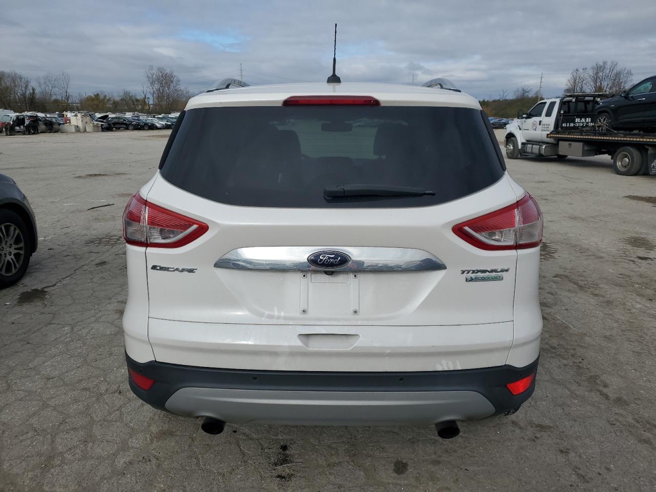 2014 Ford Escape Titanium VIN: 1FMCU0JX7EUC21619 Lot: 81846094