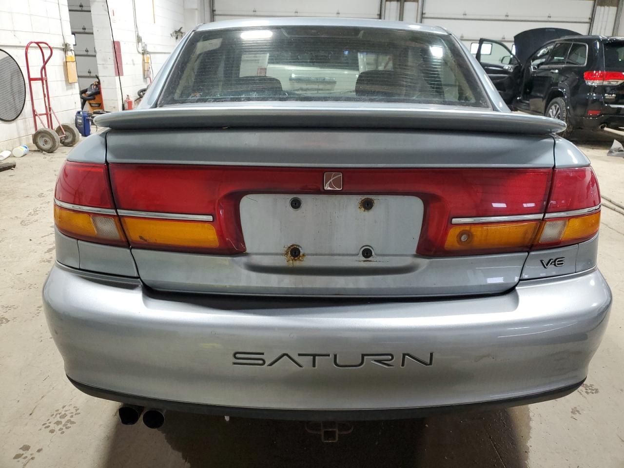 2001 Saturn L300 VIN: 1G8JW54R11Y585435 Lot: 82021364