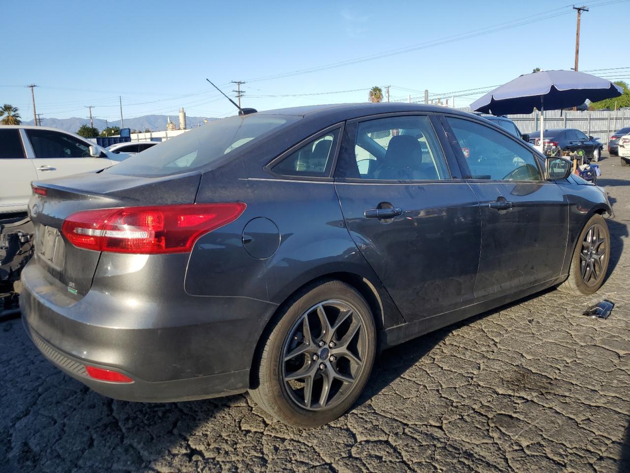 2017 Ford Focus Se VIN: 1FADP3FEXHL221073 Lot: 79886864