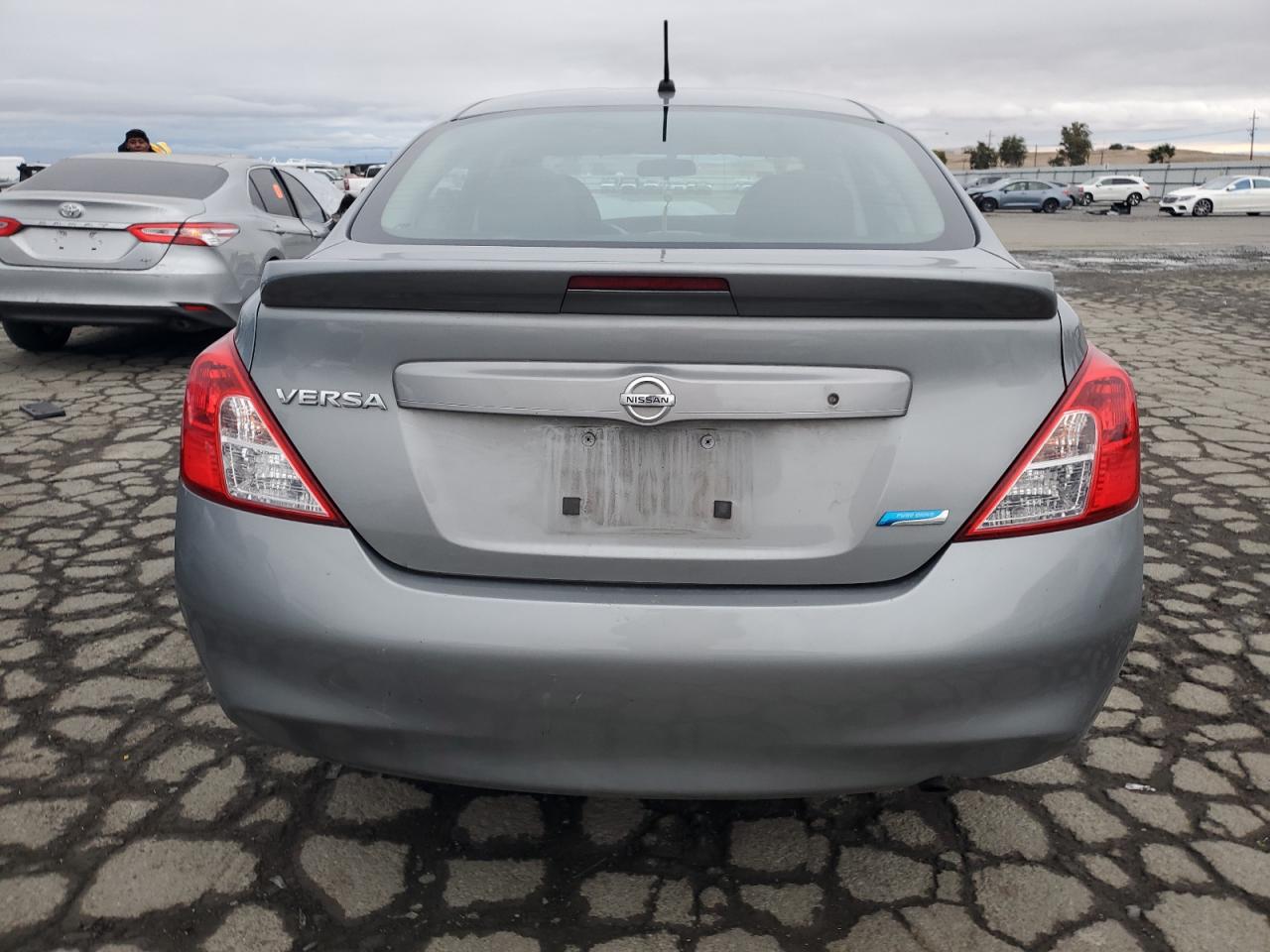 2014 Nissan Versa S VIN: 3N1CN7AP8EL848918 Lot: 82142424