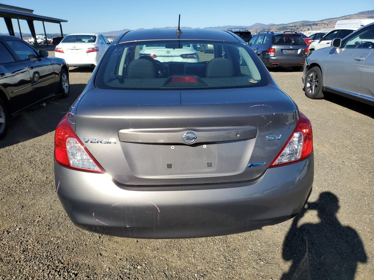 2012 Nissan Versa S VIN: 3N1CN7AP9CL828657 Lot: 78685244