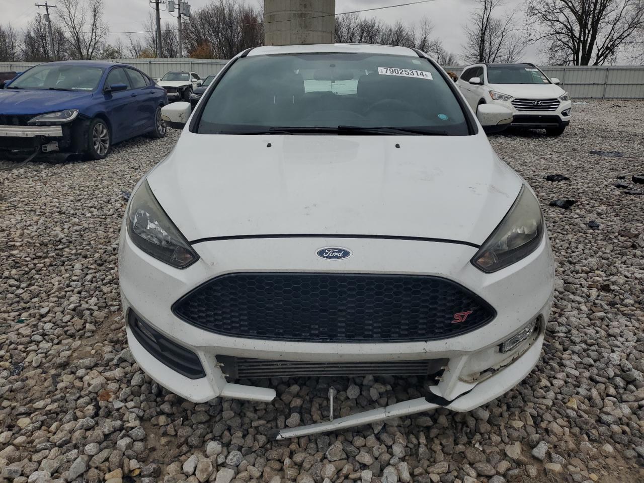 VIN 1FADP3L9XGL224464 2016 FORD FOCUS no.5