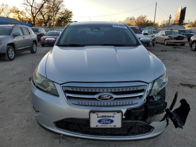 Седани FORD TAURUS 2012 Сріблястий