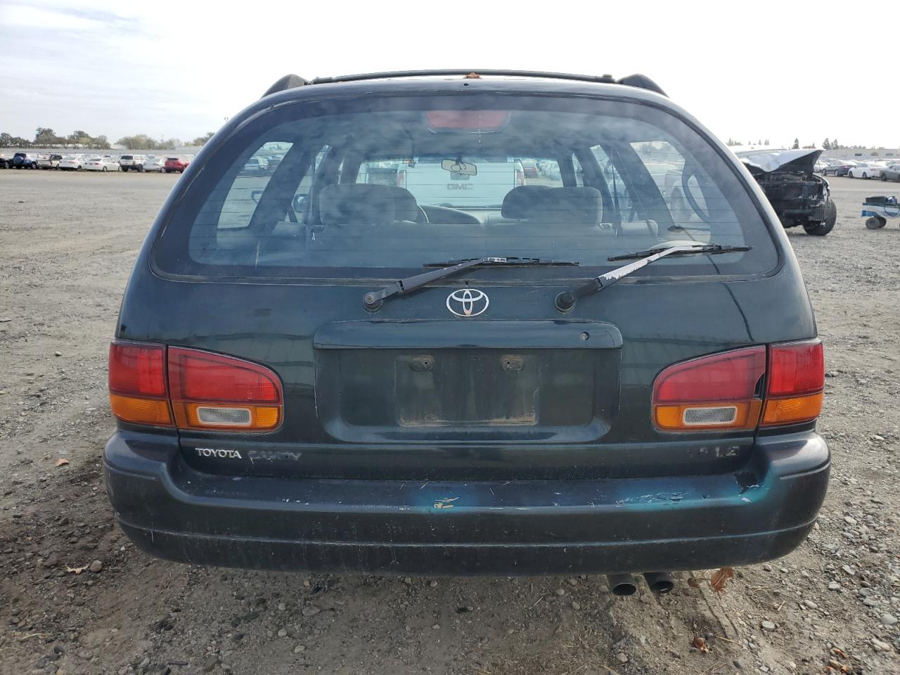 1995 Toyota Camry Le VIN: 4T1GK12W4SU079938 Lot: 77065084