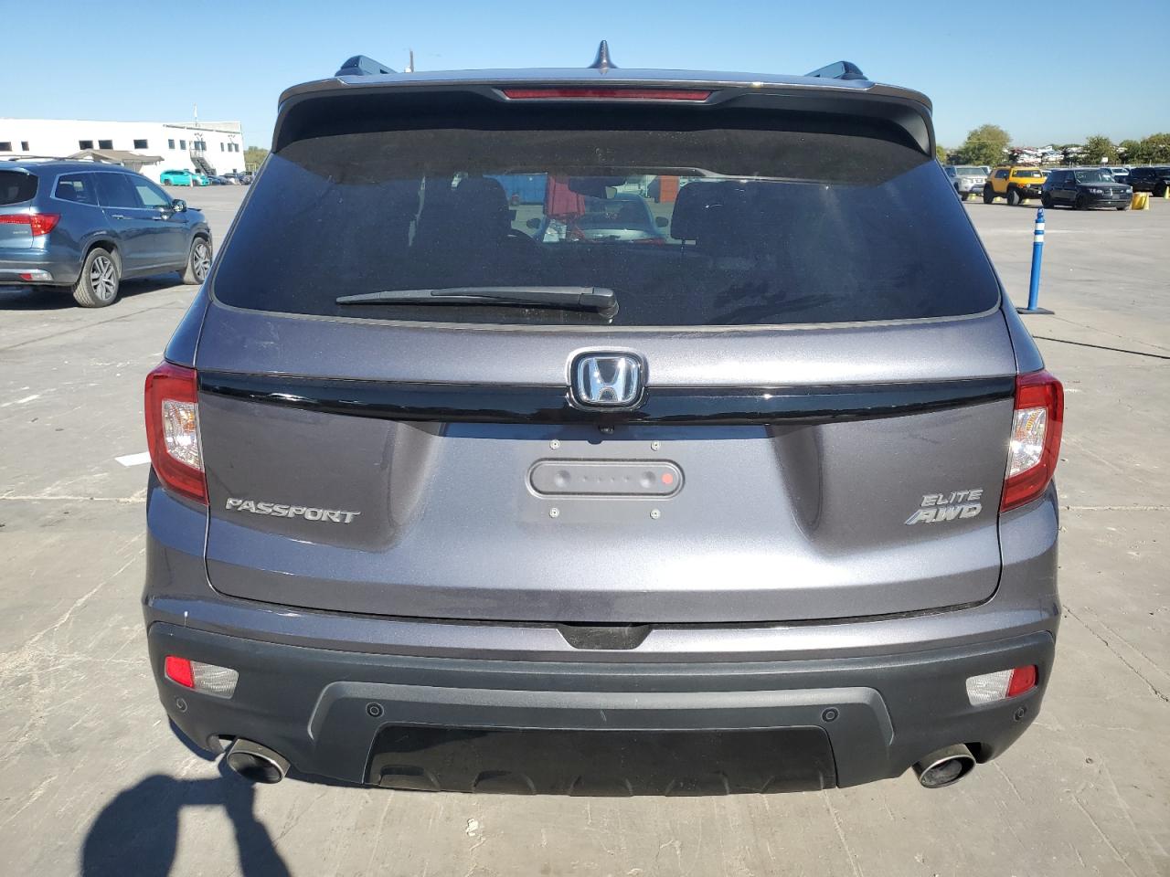 2021 Honda Passport Elite VIN: 5FNYF8H04MB034700 Lot: 80916854