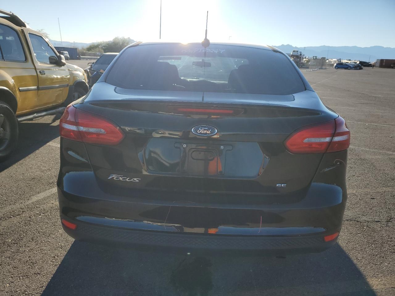 2018 Ford Focus Se VIN: 1FADP3F21JL222611 Lot: 79142824