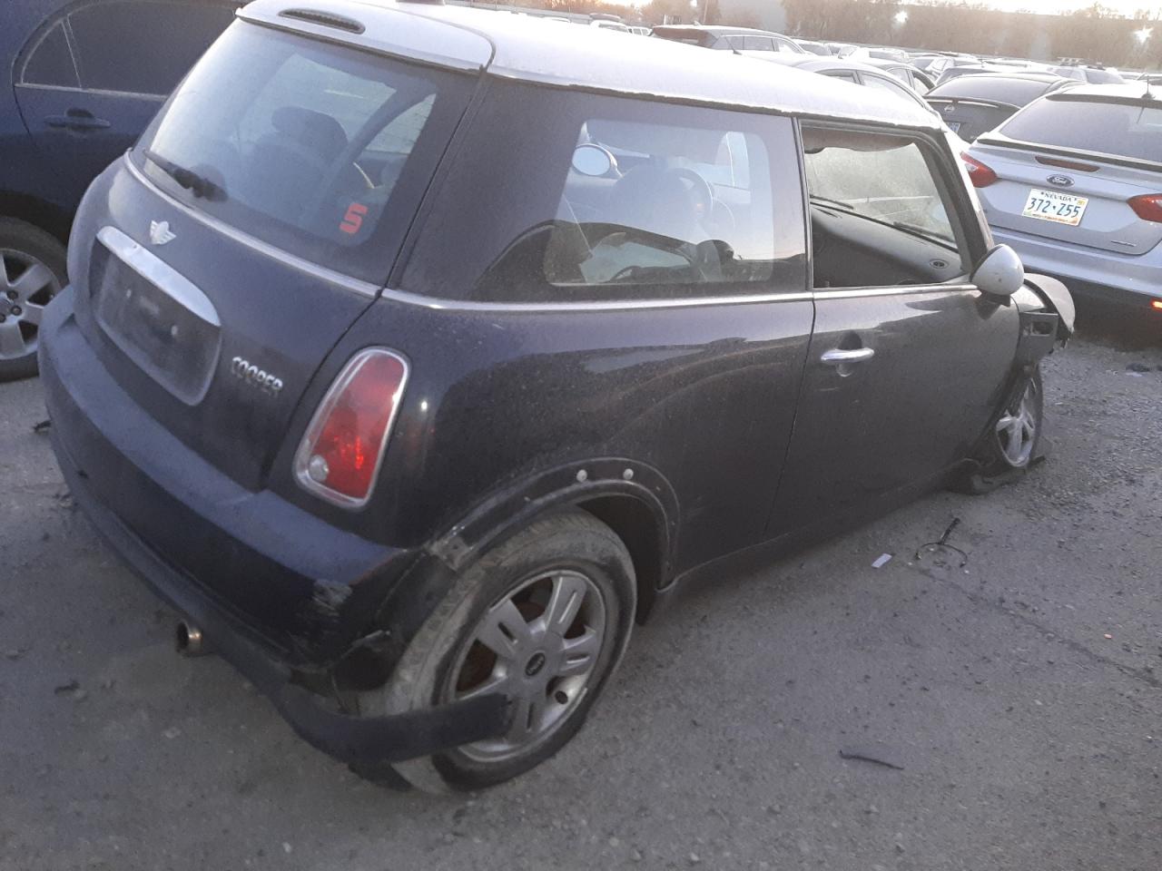 2006 Mini Cooper VIN: WMWRC33506TJ79149 Lot: 70933564