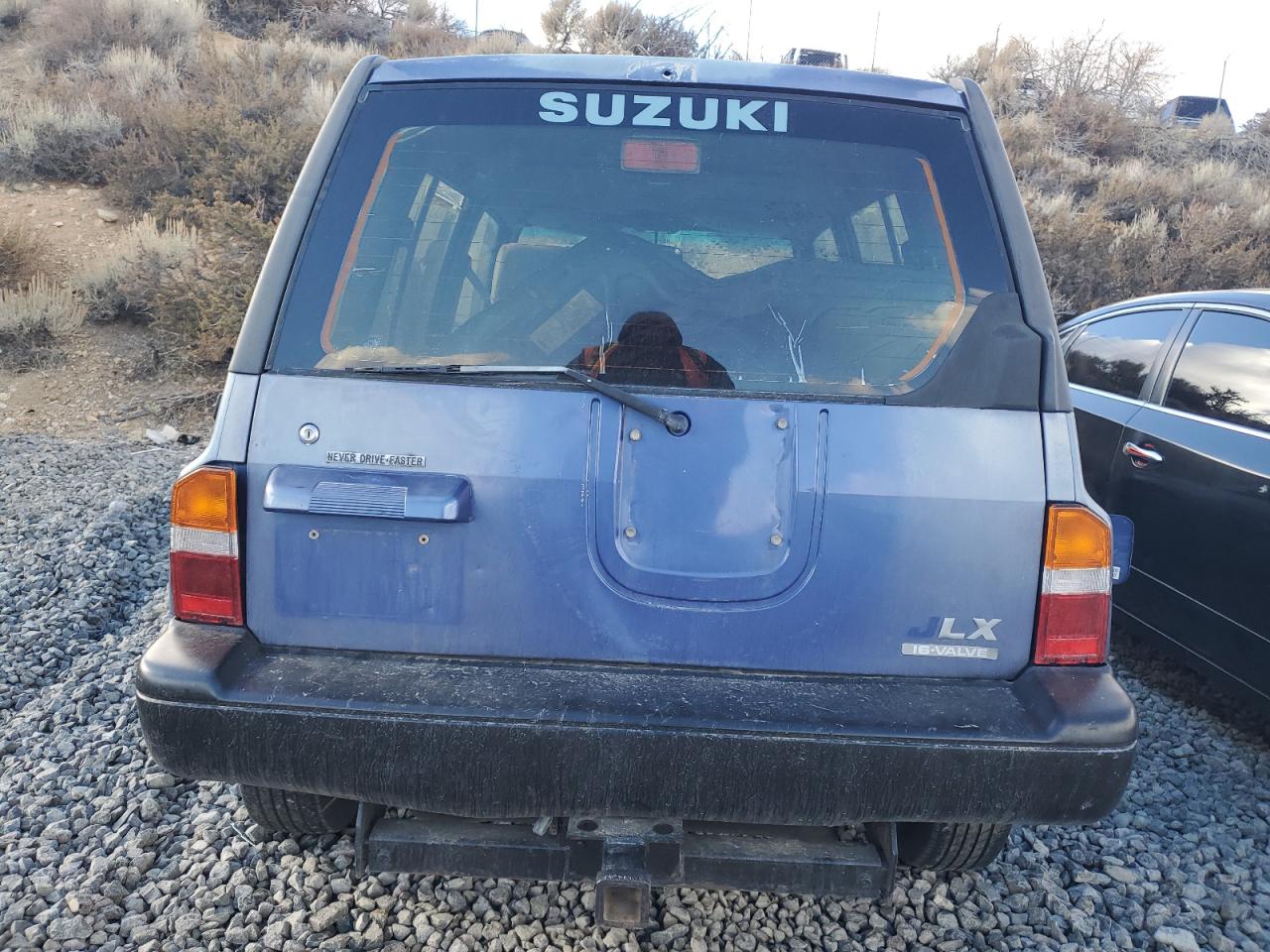 1995 Suzuki Sidekick Jx VIN: 2S3TD03V5S6403069 Lot: 80273204