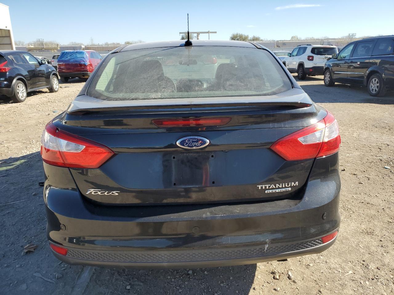 2013 Ford Focus Titanium VIN: 1FADP3J2XDL327479 Lot: 79235024