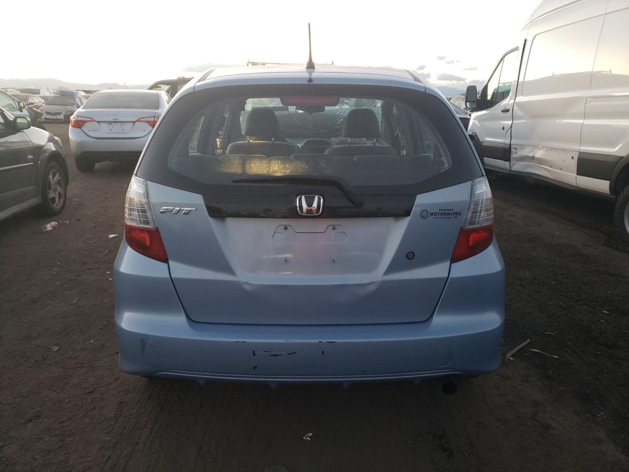 2009 Honda Fit VIN: JHMGE88229C005781 Lot: 81354664