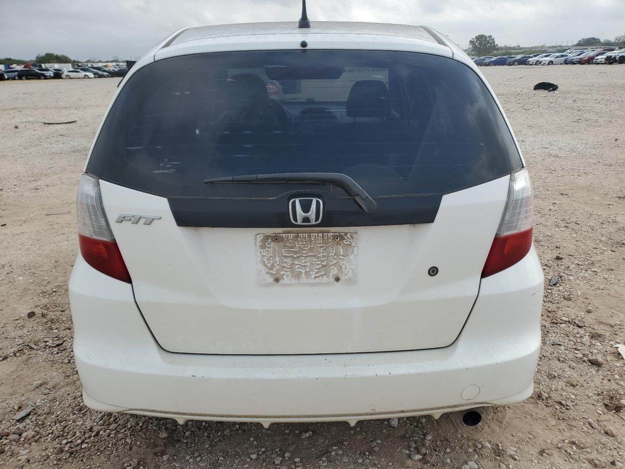 2009 Honda Fit VIN: JHMGE87249S047618 Lot: 79863054