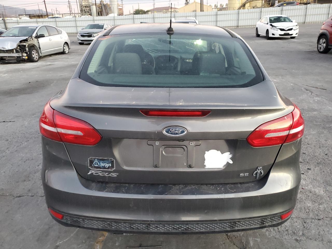 VIN 1FADP3F20HL304534 2017 FORD FOCUS no.6