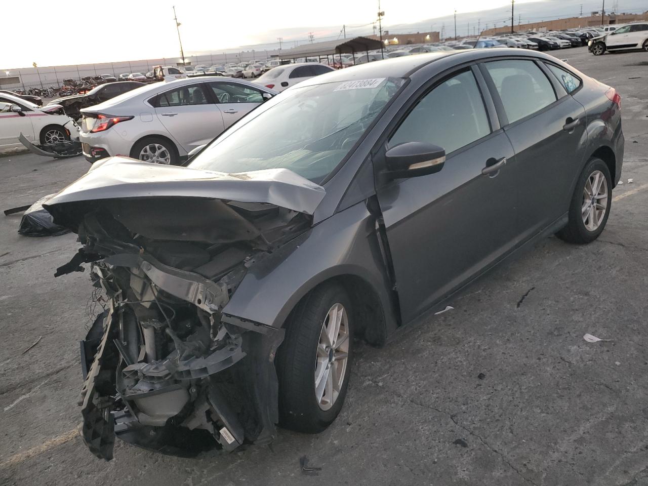 VIN 1FADP3F20HL304534 2017 FORD FOCUS no.1