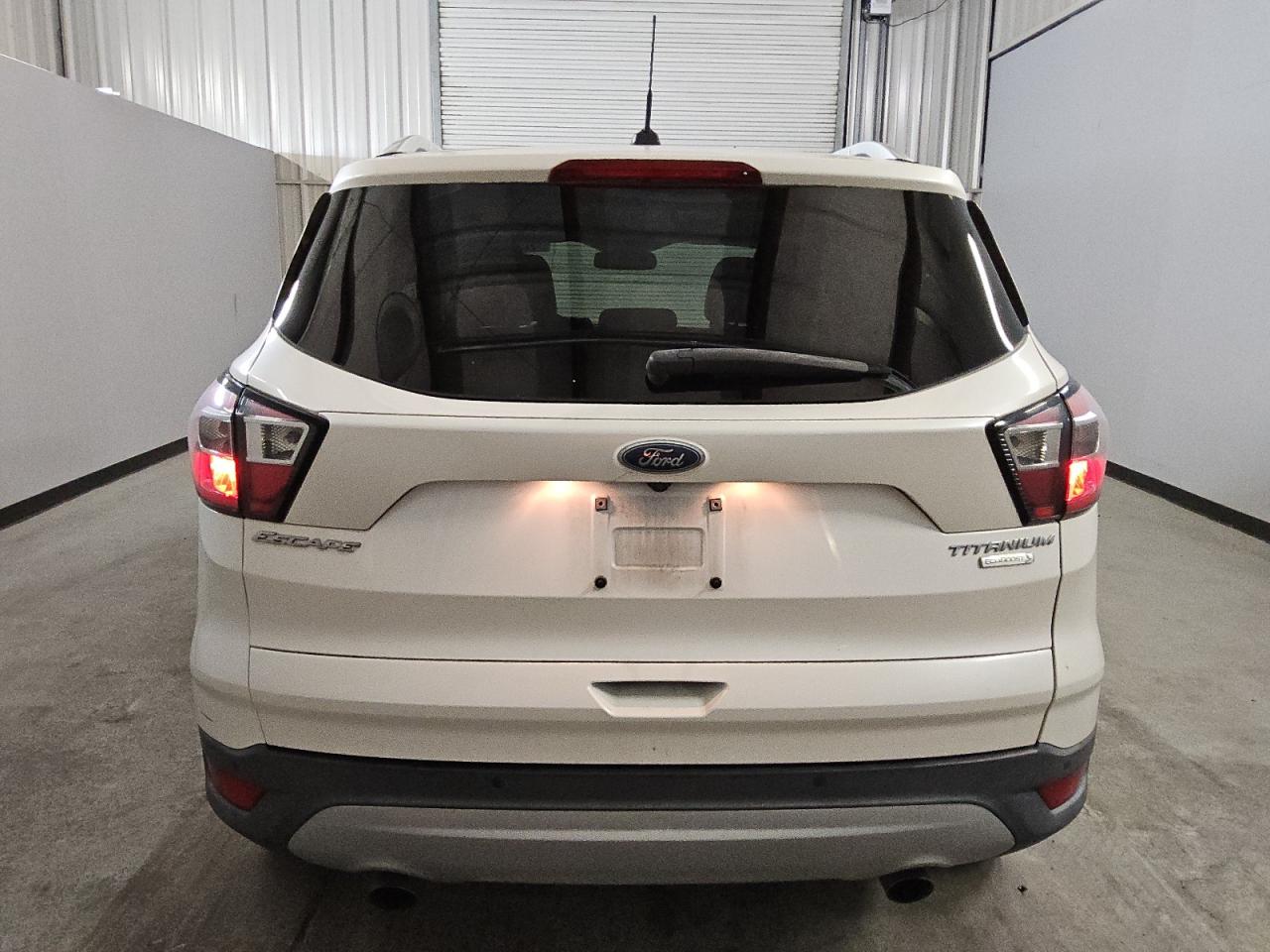 2017 Ford Escape Titanium VIN: 1FMCU0J93HUC04760 Lot: 77882474