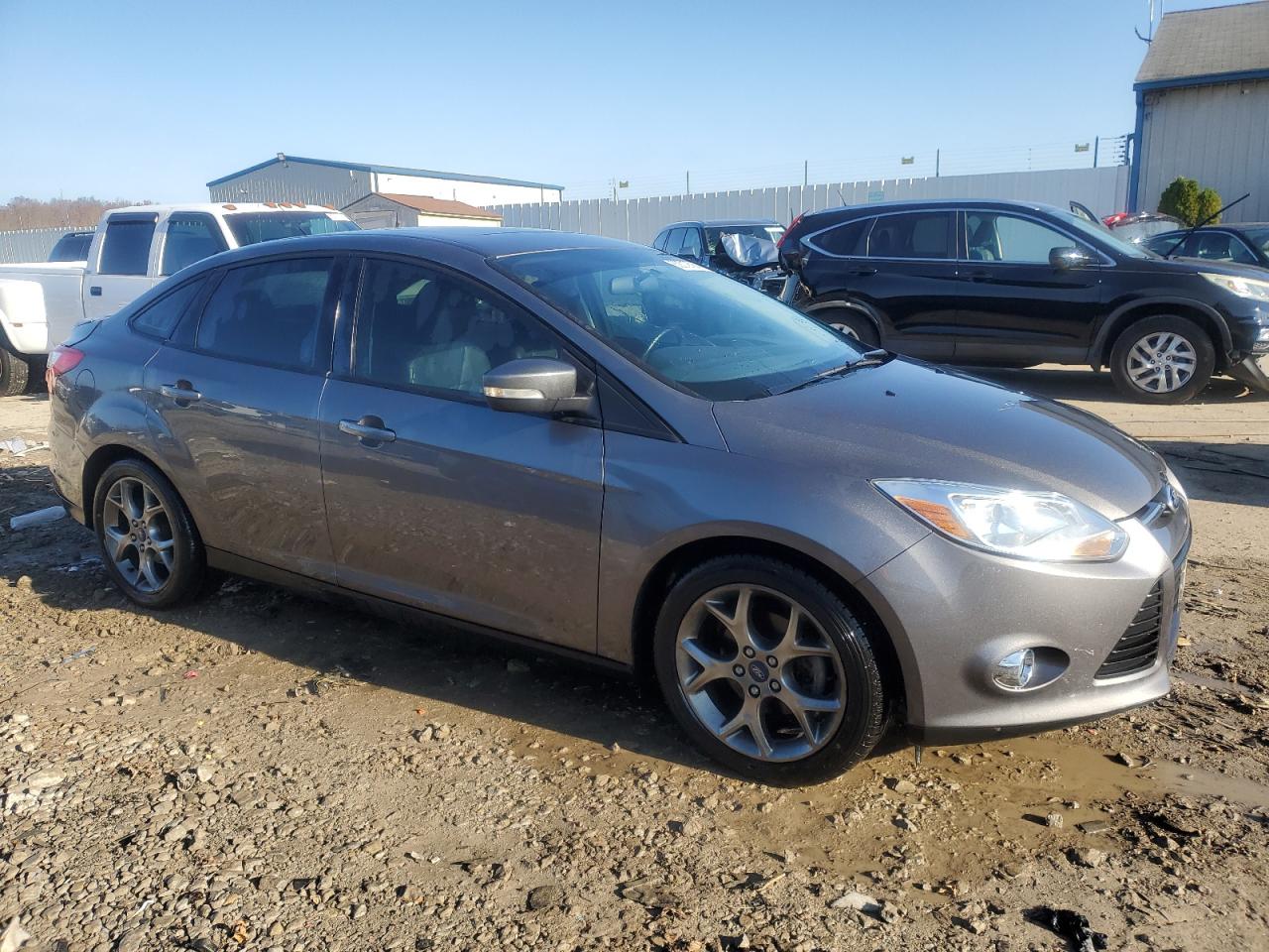 VIN 1FADP3F22DL122599 2013 FORD FOCUS no.4