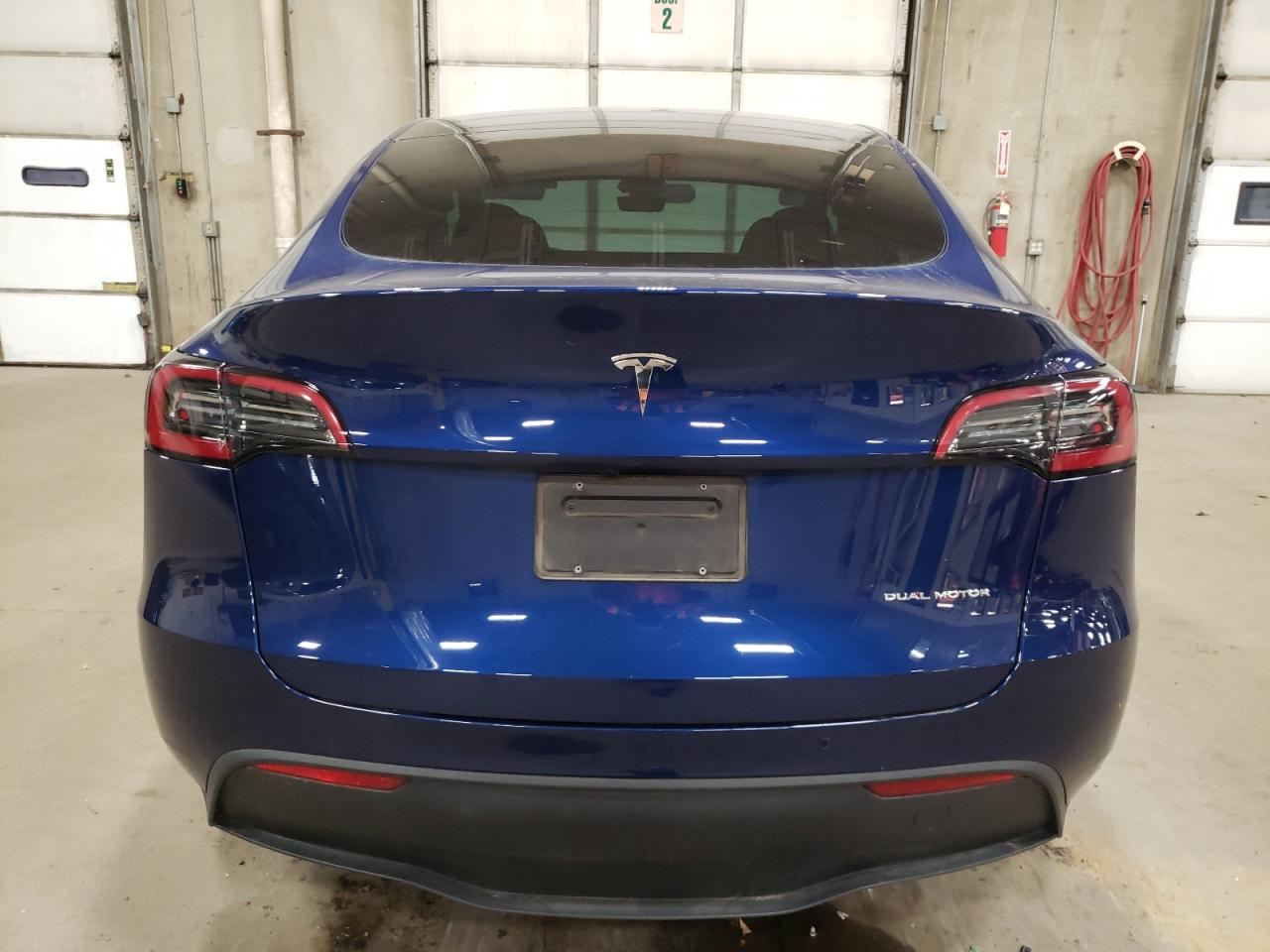 2023 Tesla Model Y VIN: 7SAYGDEE9PA188457 Lot: 80277954